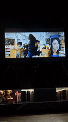 Television broadcasts romantic scene in Vologda bookstore setting