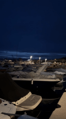 Marina boats docked at night in Cannes, France