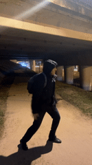 Hooded figure moves through nighttime Khimki streets, captured multiple locations