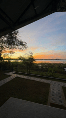 Sunset over lake captured from shelter in Polonnaruwa