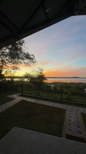 Sunset over lake captured from shelter in Polonnaruwa