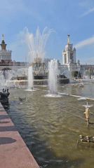Moscow's VDNKh fountain captured in clear afternoon sunshine