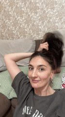 Woman and baby share playful moments in Sochi home