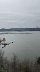 Lake views and waterfront building documented in Glavatartsi, Bulgaria