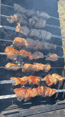 Outdoor grilling and aircraft contrail observed in Malyi Bukor
