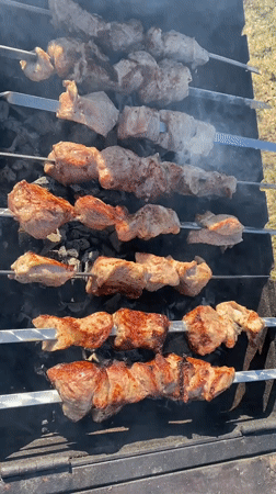Outdoor grilling and aircraft contrail observed in Malyi Bukor