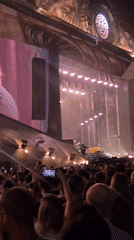 Outdoor concert night in Cluj-Napoca with a crowd in white