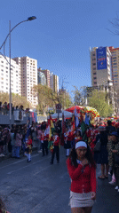 Patriotic street parade winds through central La Paz