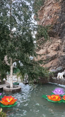 Modern resort complex in Arashan with sculpted grounds and mountain backdrop