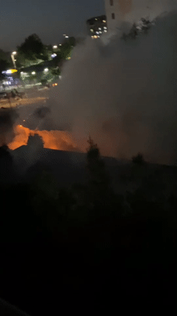 Nighttime fire burning in a pit, Tashkent