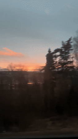 Sunset observed over wet field near Dedenevo, Russia