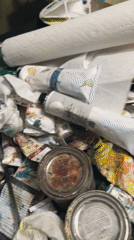 Artist's cluttered workspace documented in Cape Coral