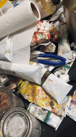 Artist's cluttered workspace documented in Cape Coral