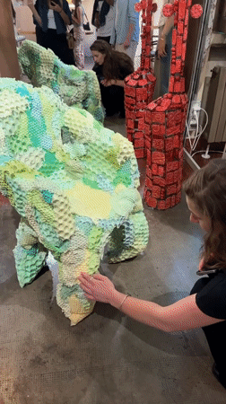 Art exhibition documented by visitors in Milan gallery