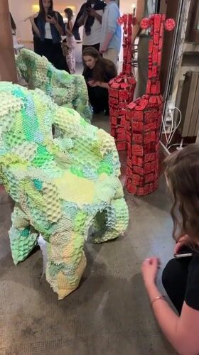 Art exhibition documented by visitors in Milan gallery