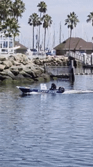 Long Beach harbor on a clear afternoon, boats and landmarks