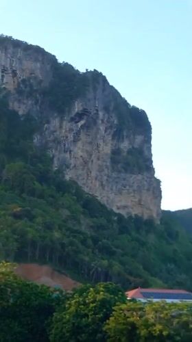 Witness documents scenic views of Ban Ao Nang coastal landscape