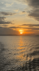Quiet sunset over the water at Don Sak, Thailand