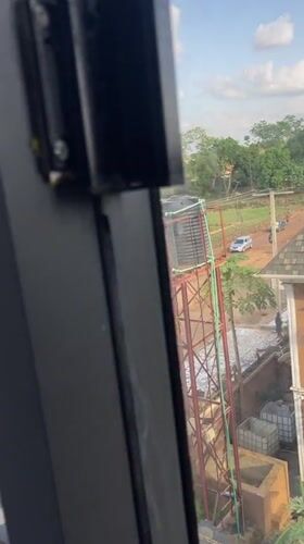 Unknown witness documents Abuja street scenes and hotel interiors