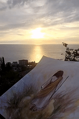 Watercolor paintings and a ginger cat meet the Black Sea sunset