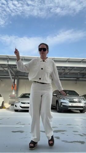 Woman filmed dancing, posing in Dubai parking lot