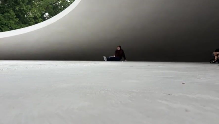 Wet concrete and a curved structure in Tonosho after rain