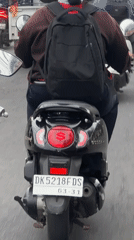 Scooters with dollar sign taillight spotted in Denpasar