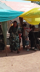 Community celebration held under decorated tent in Goni Gara