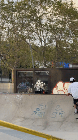 BMX rider performs at concrete skate park in Badalona