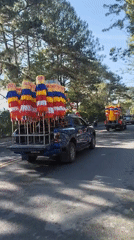 Decorated vehicle procession travels through Da Lat, Vietnam