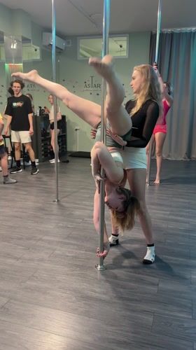 Women attend pole dancing class in Batumi fitness studio