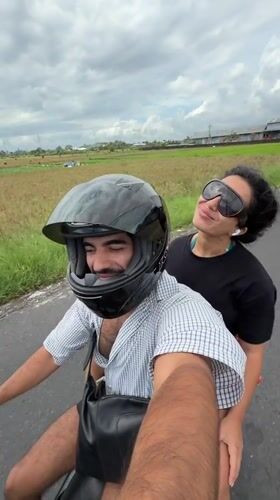 Couple spotted riding scooter in Kediri, Indonesia