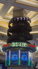 LED pillar displays "777" in Russian casino interior