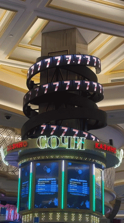 LED pillar displays "777" in Russian casino interior