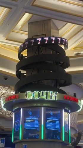 LED pillar displays "777" in Russian casino interior