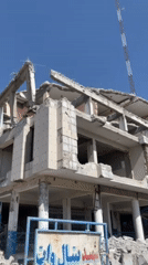 Extensive building damage documented in Kandahar amid street activity