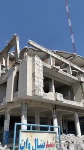 Extensive building damage documented in Kandahar amid street activity