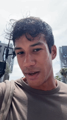 Young man films video on Hollywood Walk of Fame