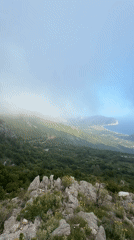 Mountainous landscape with fog patches filmed in Montenegro