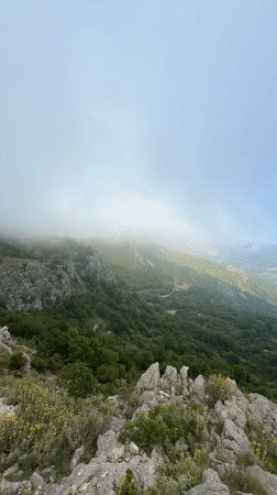 Mountainous landscape with fog patches filmed in Montenegro