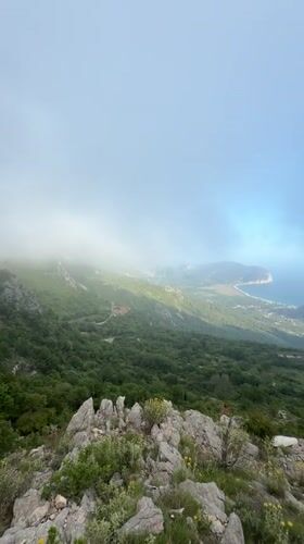 Mountainous landscape with fog patches filmed in Montenegro