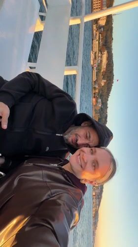 Couple takes sunset selfie on Bosphorus boat near Istanbul