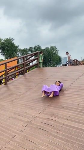 Family enjoys late-night park visit in Sidoarjo, Indonesia