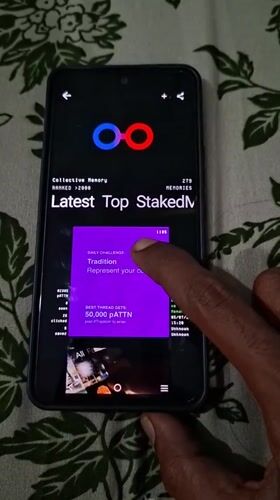 Person uses Collective Memory app on smartphone in Indonesia