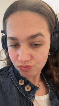 Woman takes mirror selfies with Pokémon phone case in Milan