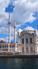 Cruising the Bosphorus past mosques and bridges in Istanbul