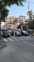 Street scenes and a city building during a casual daytime outing