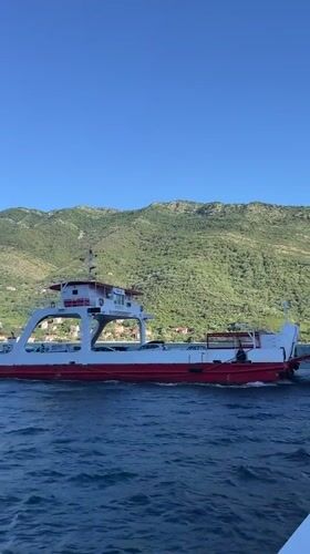 Morning ferry crossing documented at Montenegro's Bay of Kotor