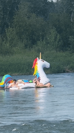 Inflatable unicorn float day on a Calgary river