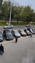 Car displays Russian flag while driving through Tiraspol street